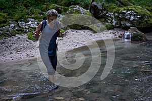 Womah hiker exploring a gorge