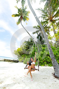 Womain in beach hammock