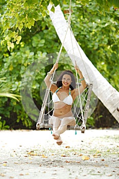 Womain in beach hammock