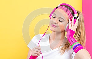 Woman in 1980`s fashion with headphones