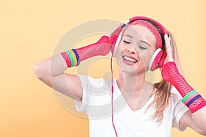 Woman in 1980`s fashion with headphones