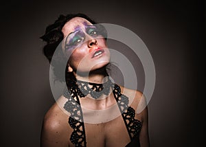 Woman with a 20`s cabaret make-up look