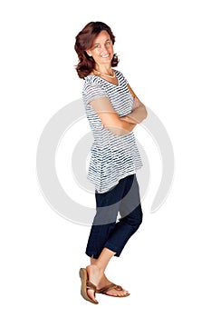 Woman in 30s in top with stripes and jeans