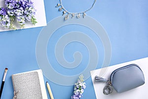Woman accessories on blue background