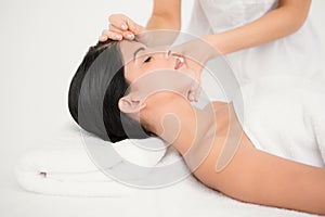 Woman in an acupuncture therapy