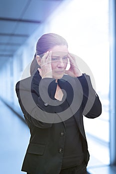 Woman acute headache migraine attack photo