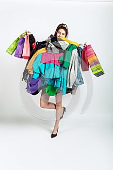 Woman addicted of sales and clothes, overproduction and crazy demand