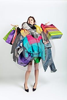 Woman addicted of sales and clothes, overproduction and crazy demand