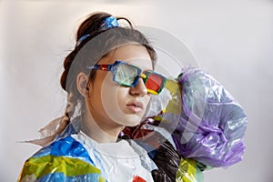 Woman addicted of sales and clothes, wearing plastic, recycling concept