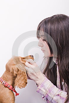 Woman with adorable cute puppy