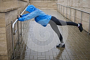 Woman adult doing bodyweight glute and leg exercises on outdoor