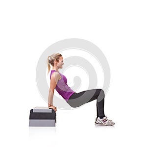 Woman, aerobics step and exercise in studio profile with smile, training or health by white background. Girl, person and