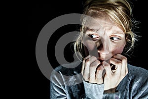 Woman Afraid of something in the Dark photo