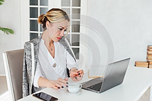 Woman afraid on video call at work