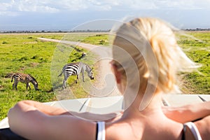 Woman on african wildlife safari.