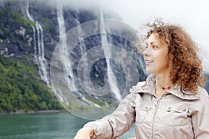 Woman against Seven Sisters Waterfall