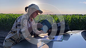 Woman agronomist prepares for field research