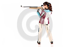 Woman aiming a pneumatic air rifle photo