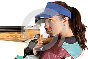 Woman aiming a pneumatic air rifle