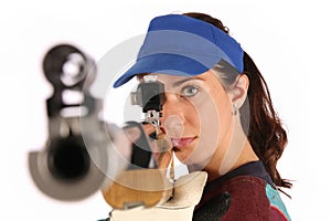 Woman aiming a pneumatic air rifle photo