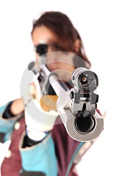 Woman aiming a pneumatic air rifle