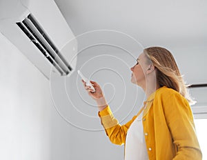 Woman and air conditioner