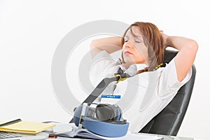 Woman airline pilot sleeping in the office