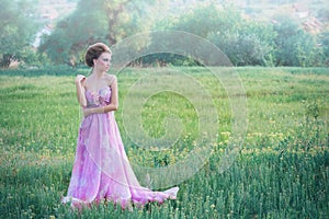 Woman in airy pink dress