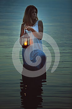 Woman alone in dark waters