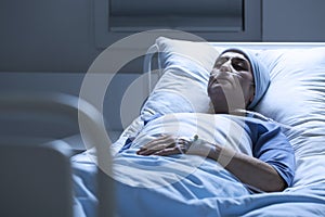 Woman alone in hospital bed