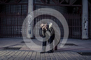 Woman alone on street suffering depression looking sad desperate and helpless