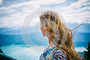 Woman in alp mountains looking at Walchensee photo