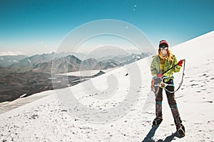 Woman alpinist mountain climbing glacier