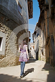 Woman at ancient street