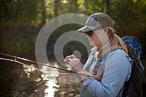 woman angler fly fishing