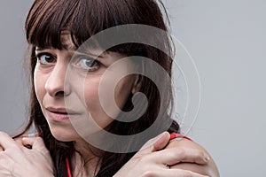 Woman in anguish, yearns for brighter future