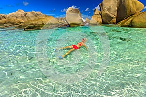 Woman at Anse Marron pool