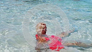 Woman at Anse Marron pool