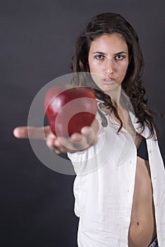 Woman with apple and money in a temptation