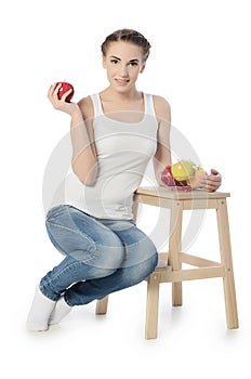 The woman with apples isolated on white background