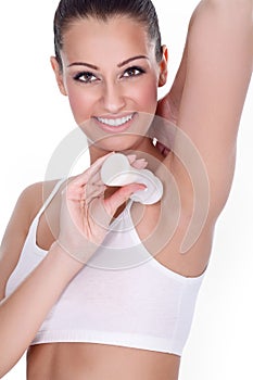 Woman applying anti perspirant