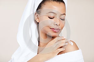 Woman Applying Body Cream