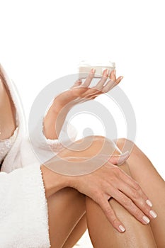 Woman applying cream photo