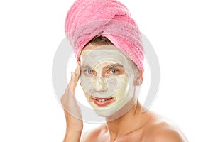 Woman applying facial cream