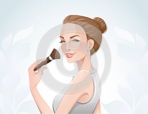 Woman applying make-up
