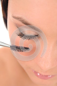 Woman applying makeup