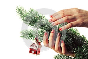 Woman applying nail varnish to finger nails