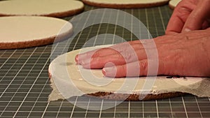 Woman applying paste on cortical table