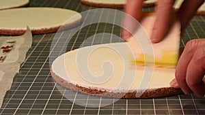 Woman applying paste on cortical table