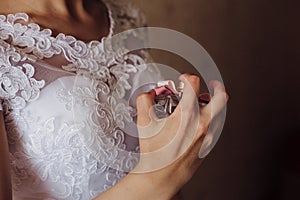 Woman applying perfume on her wrist